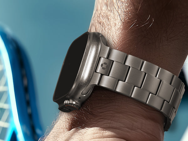 FINESTONE titanium Apple Watch Ultra band shown open, highlighting secure magnetic clasp design