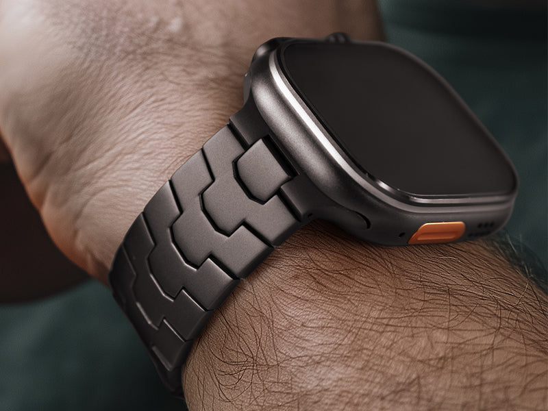 FINESTONE titanium Apple Watch Ultra band showing premium metal links and adjustable fit
