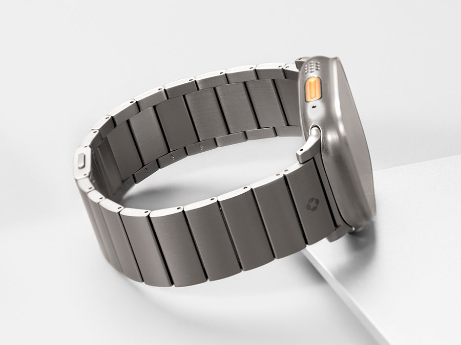 Lightweight titanium metal strap for Apple Watch Ultra with a smooth brushed finish